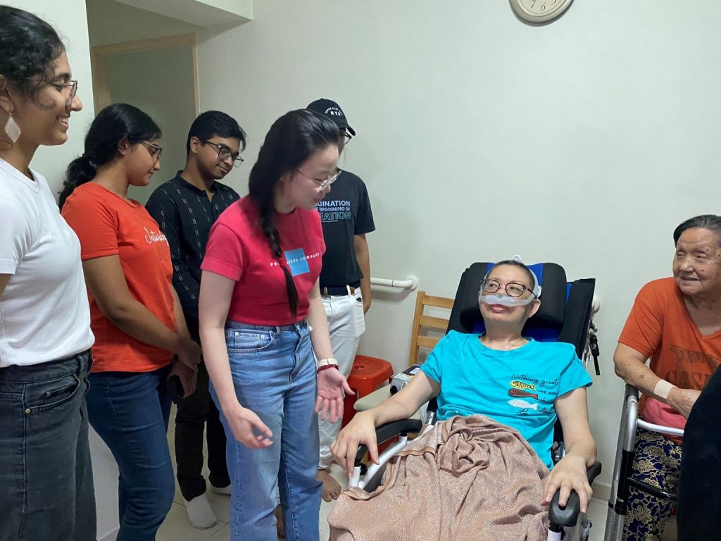 NTU LKCMedicine scholar Loh Pei Yi visiting a patient