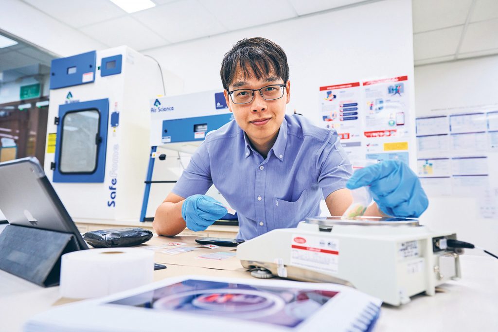 In his six years with CNB, DSP Lim (seen weighing a substance sample) has undergone various job postings, including being deployed as an investigation officer and working on policies. PHOTO: STEPHEN LIM