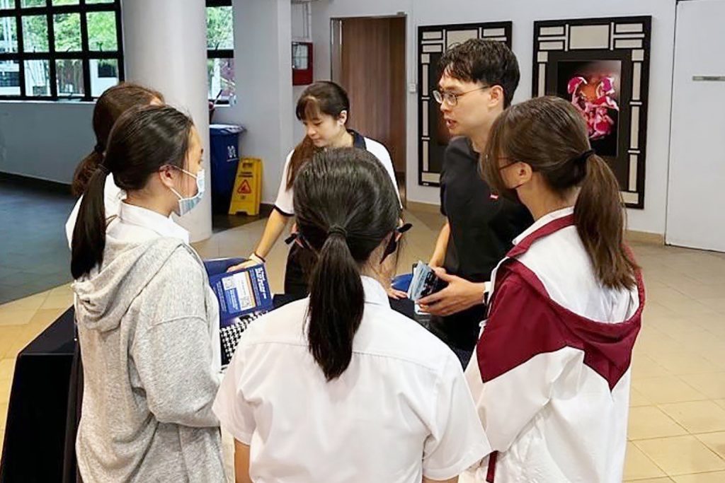 As a CNB Career Ambassador, DSP Lim visits schools and institutes of higher learning as well as job fairs to share more about the agency to potential scholarship applicants. PHOTO: STEPHEN LIM