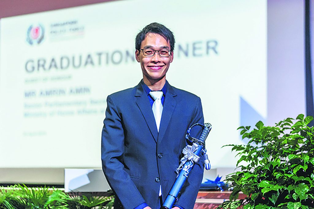 DSP Lim graduated from his Senior Officer Basic Course at the Home Team Academy with the Sword of Merit. PHOTO: STEPHEN LIM