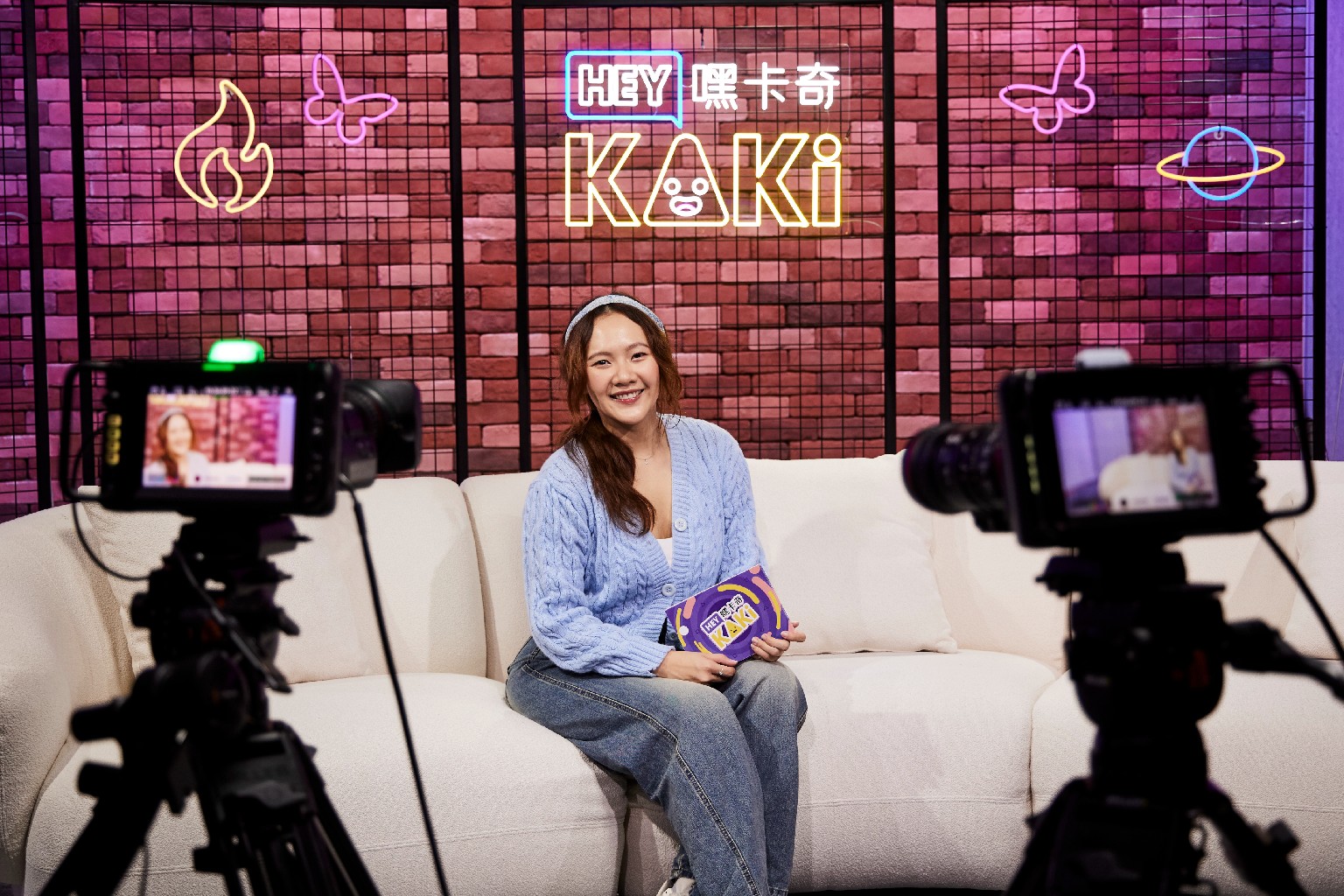 SPH scholar Zhang Xi Yi on set at HeyKaki at SPH Media studio