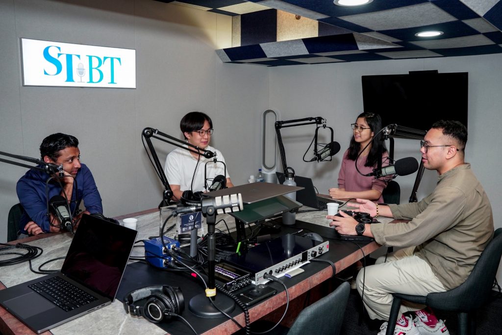 investigative reporter aqil hamzah with colleagues from st now recording podcast with ntu associate professor walid jumblatt abdullah and third-year nus undergraduate maximilian oh