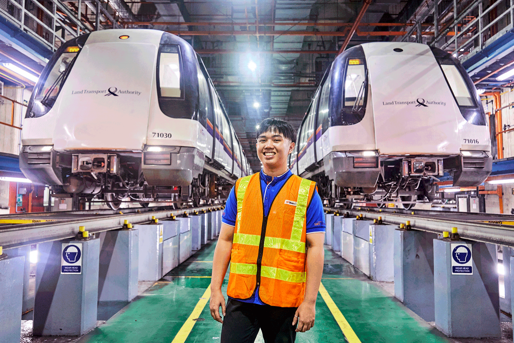 train enthusiast and sgrail industry scholar adam wee in examination building of NEL depot