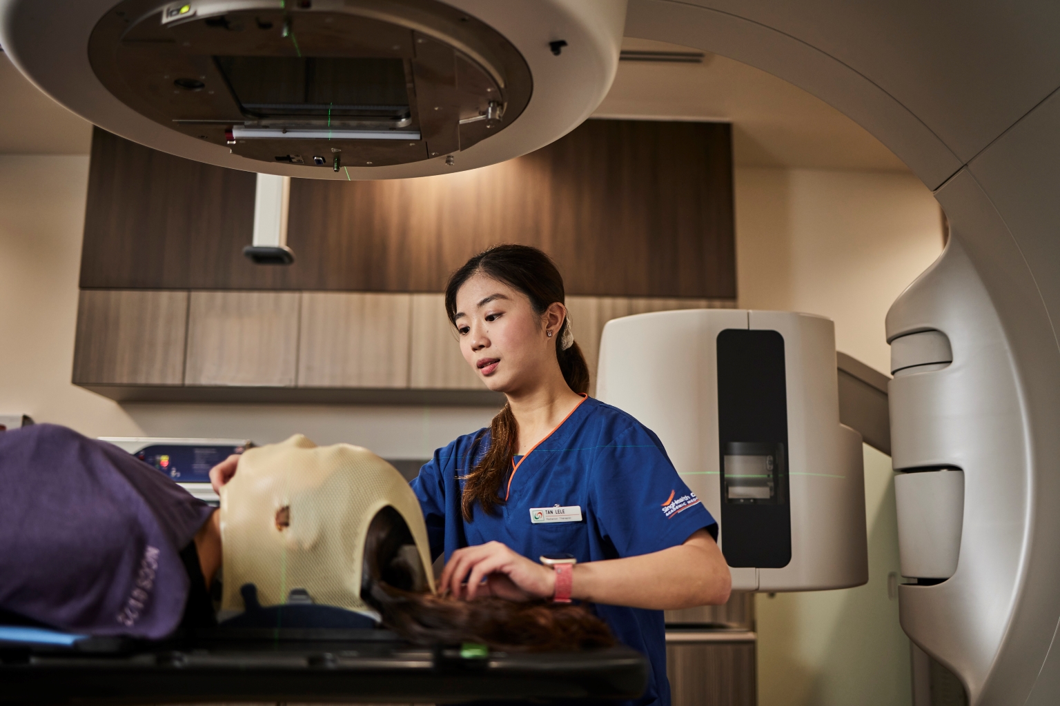 Tan Lele is part of the division of radiation oncology at the National Cancer Centre Singapore, where she administers radiation therapy for cancer patients. PHOTO: SPH MEDIA