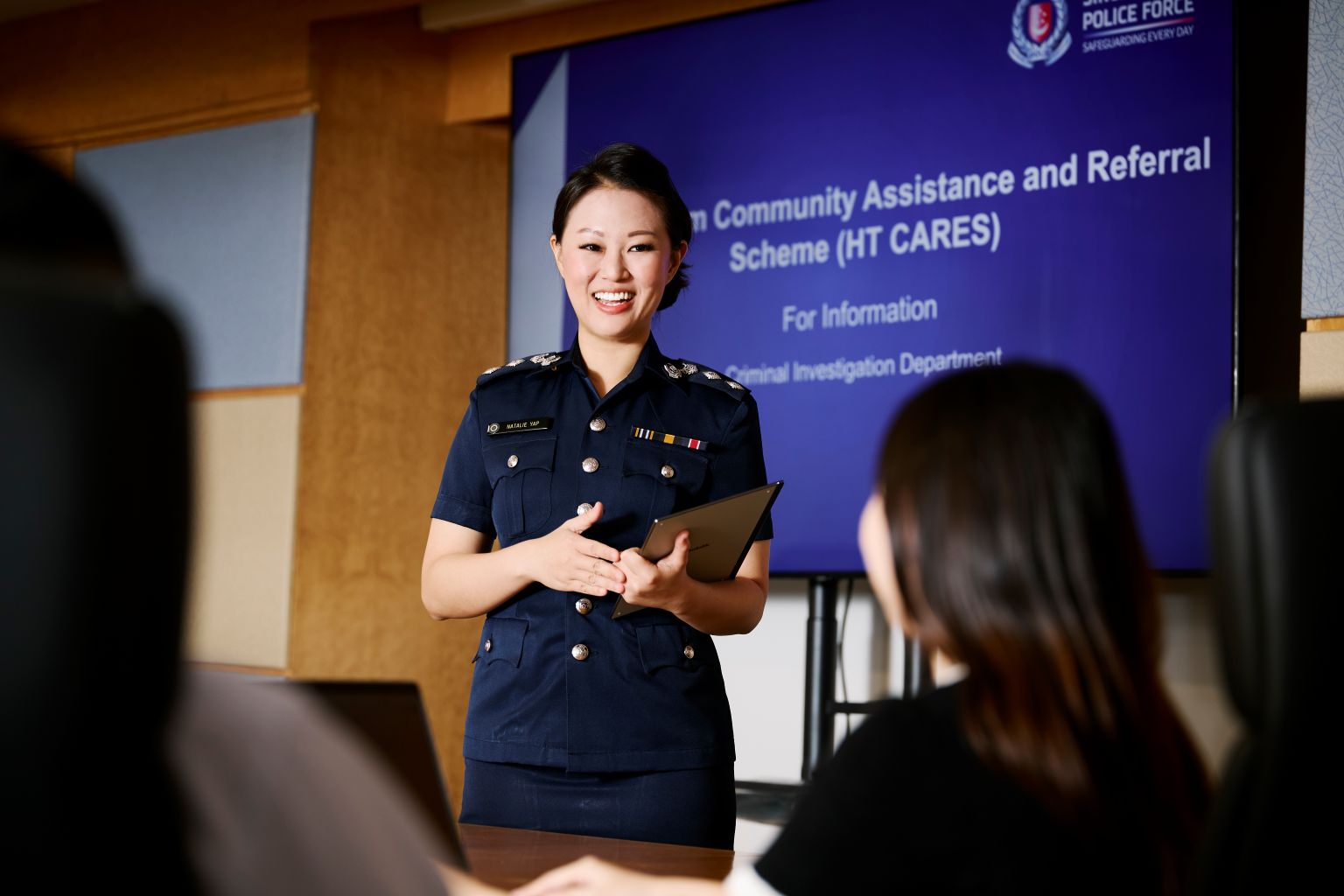 Supt Natalie Yap making a presentation at the CID office