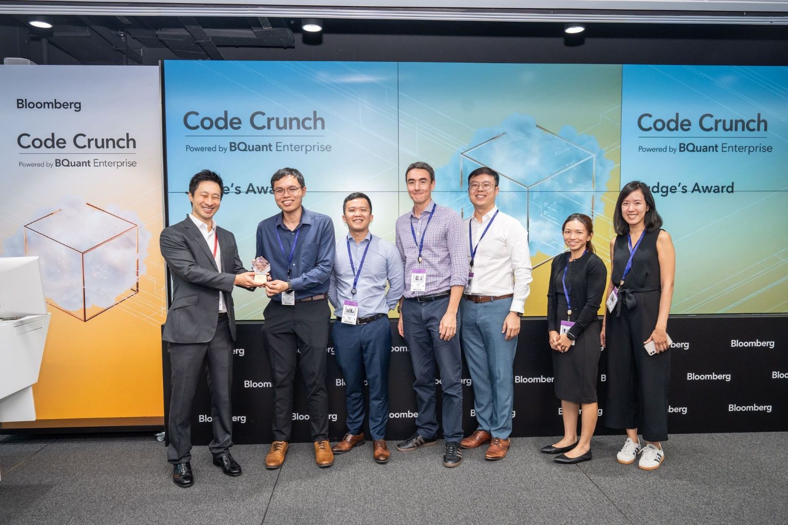 Fan Jia Ron (second from left), and his teammates took home two wins – the Judges’ Pick and the Most Popular Award – at Bloomberg's inaugural Code Crunch Hackathon in October 2025. PHOTO: MAS