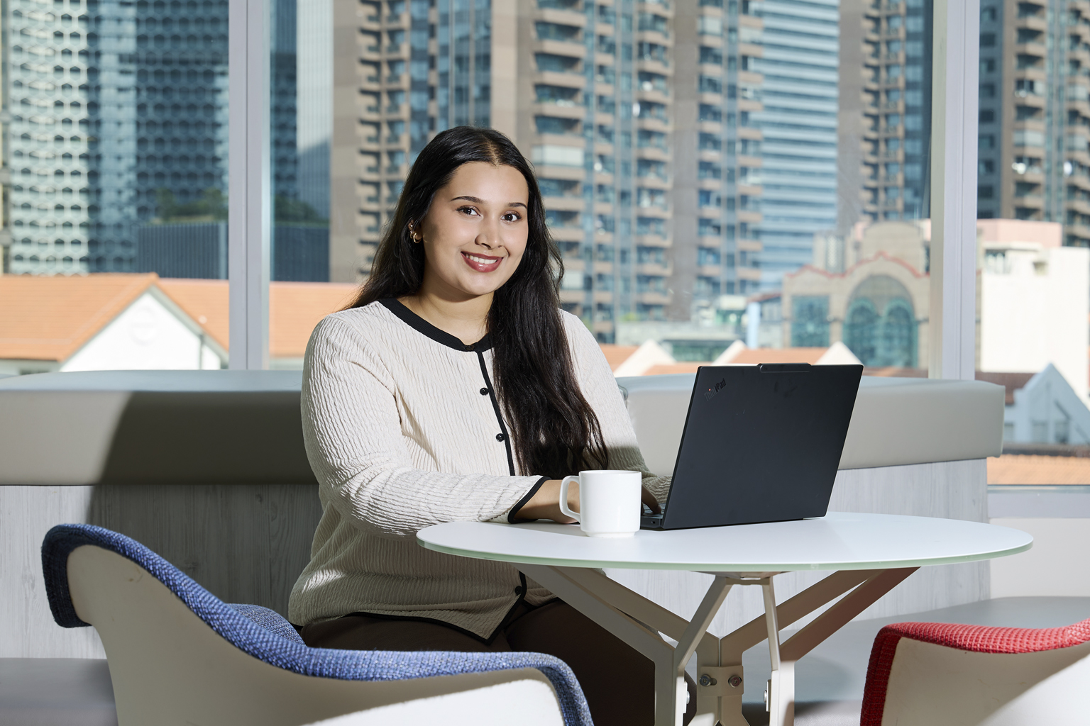 MaritimeONE scholar Fatimah Zahra Ebnuarabi working at the Bernhard Schulte Singapore office