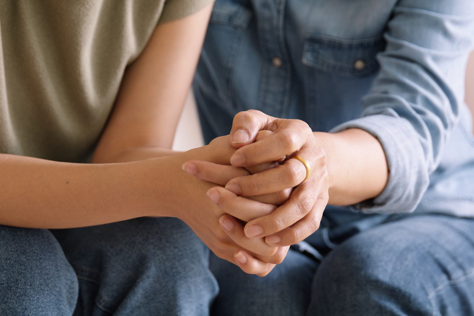 parent comforting a child after a scholarship rejection