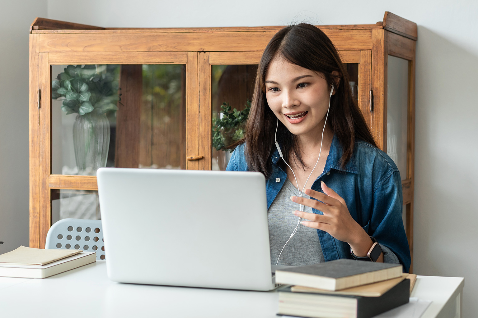 student speaking during an online scholarship interview