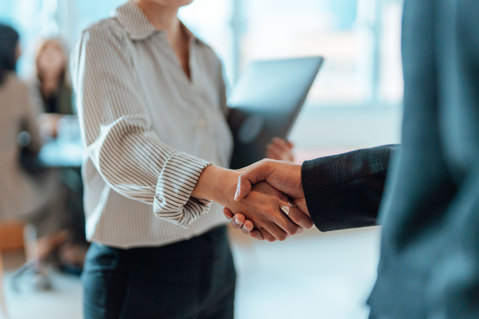 a handshake during a scholarship interview
